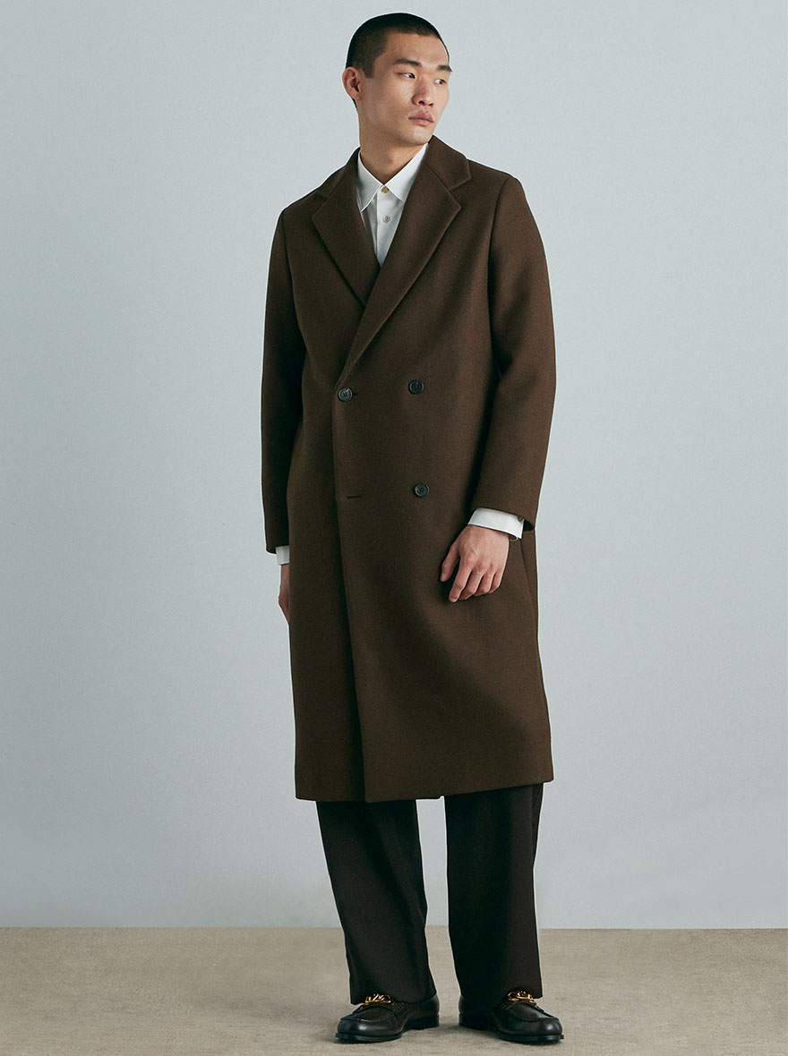 Man in brown tailored coat