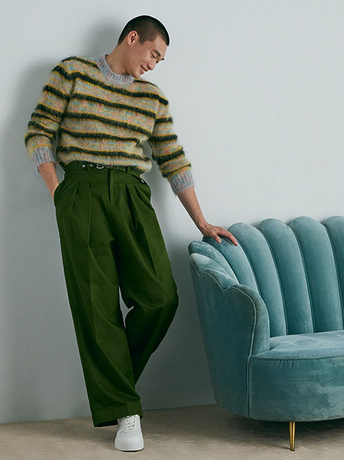 Man in stripy jumper and trousers